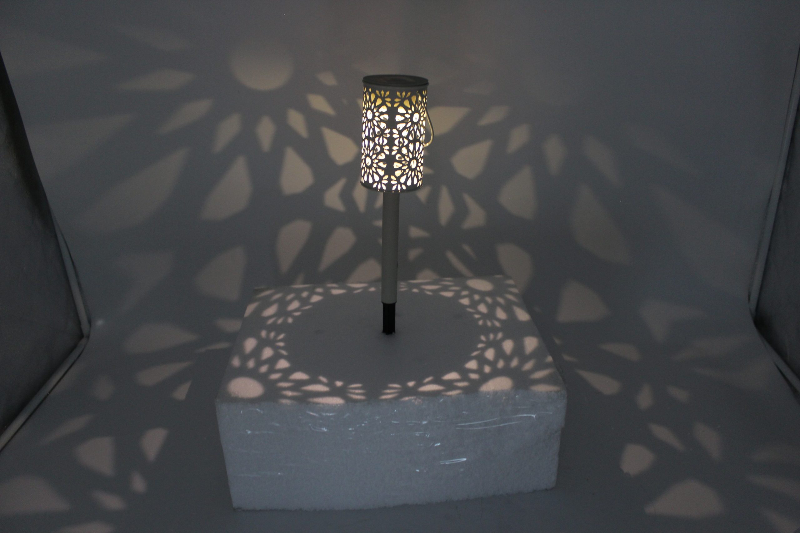 Metal garden decor product showing open structural design