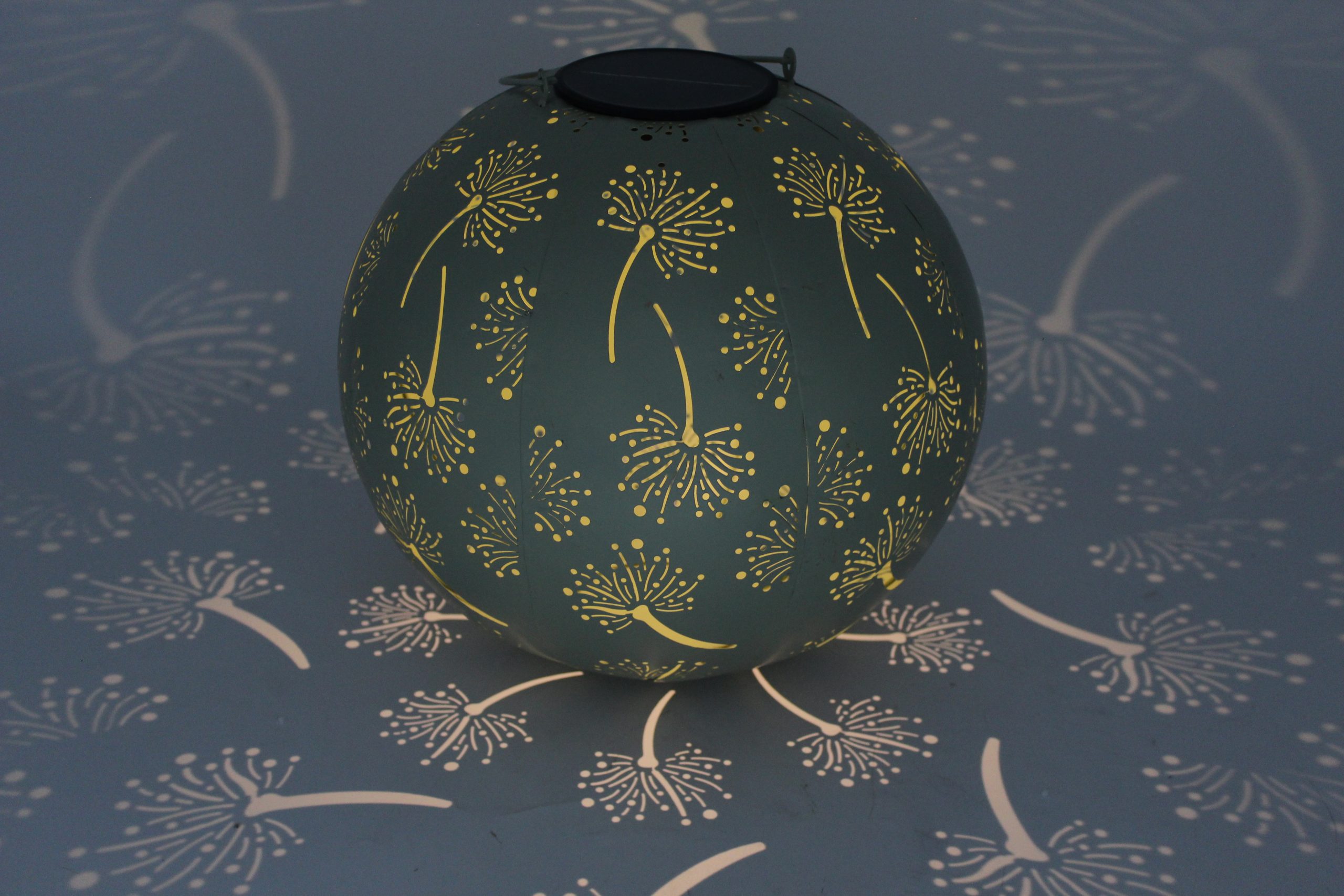 Metal garden decor product with decorative structure